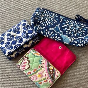 Vera Bradley Bundle two wallets and a small make up bag.